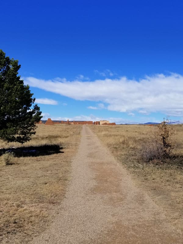 dirt path leading to historic fort ruins in Fort Union National Monument
