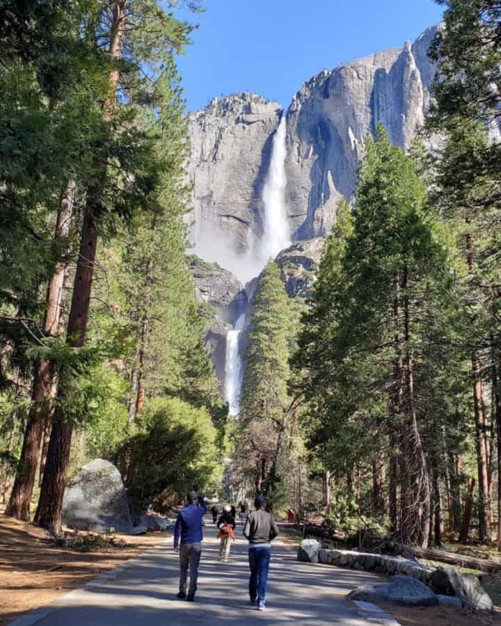 Hiking towards Yosemite Falls with Yosemite Falls in the background