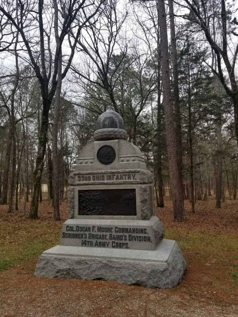 33rd Ohio Infantry Monument with trees behind it