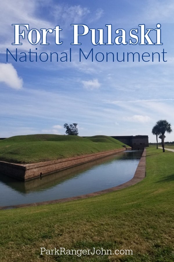 Fort Pulaski National Monument over the moat and green grass