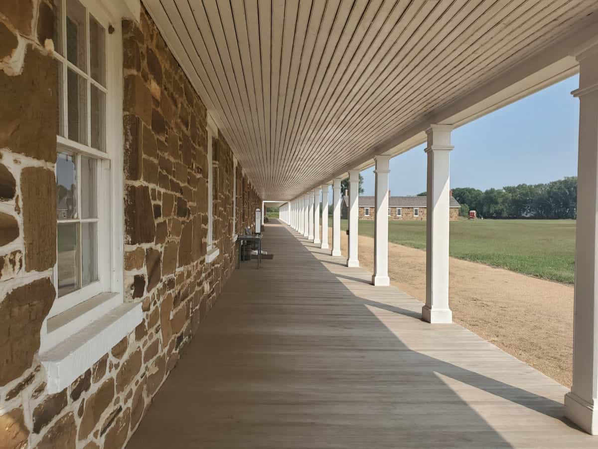 Covered walkway of a brick building at Fort Larned