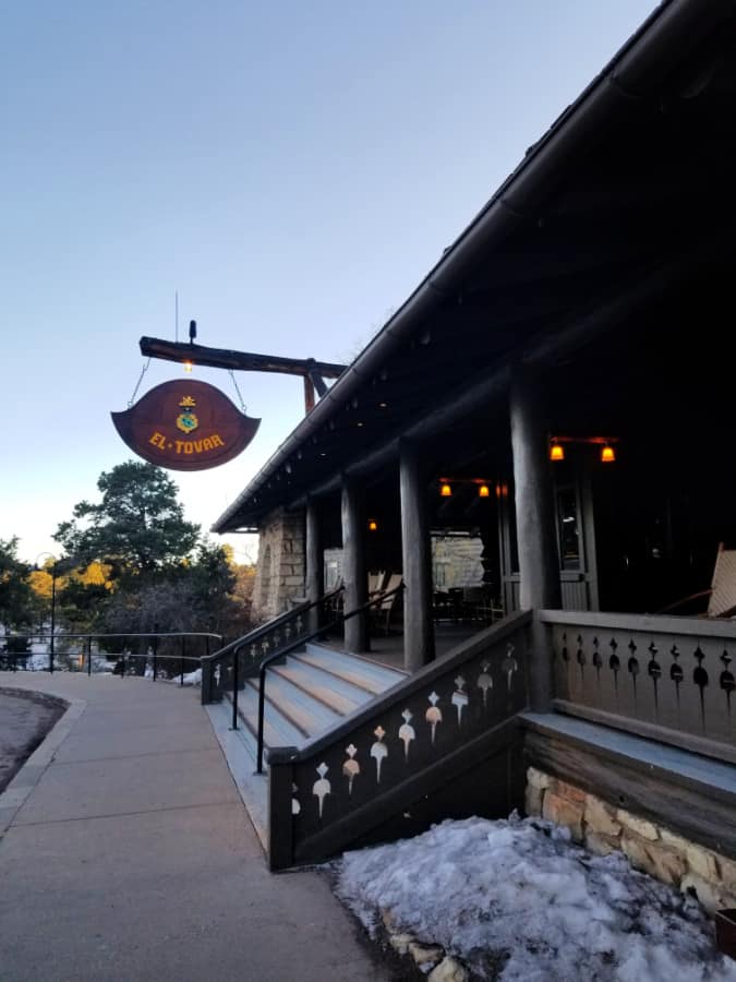 El Tovar entrance sign over wooden stairs leading into the hotel