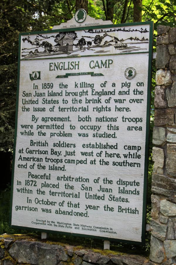 English Camp historic sign with information on San Juan Island National Historical Park, Washington