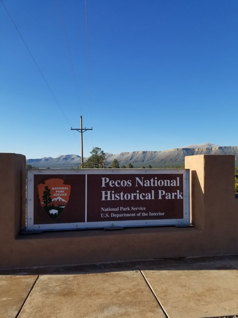 Pecos National Historical Park entrance sign with National Park Service Emblem