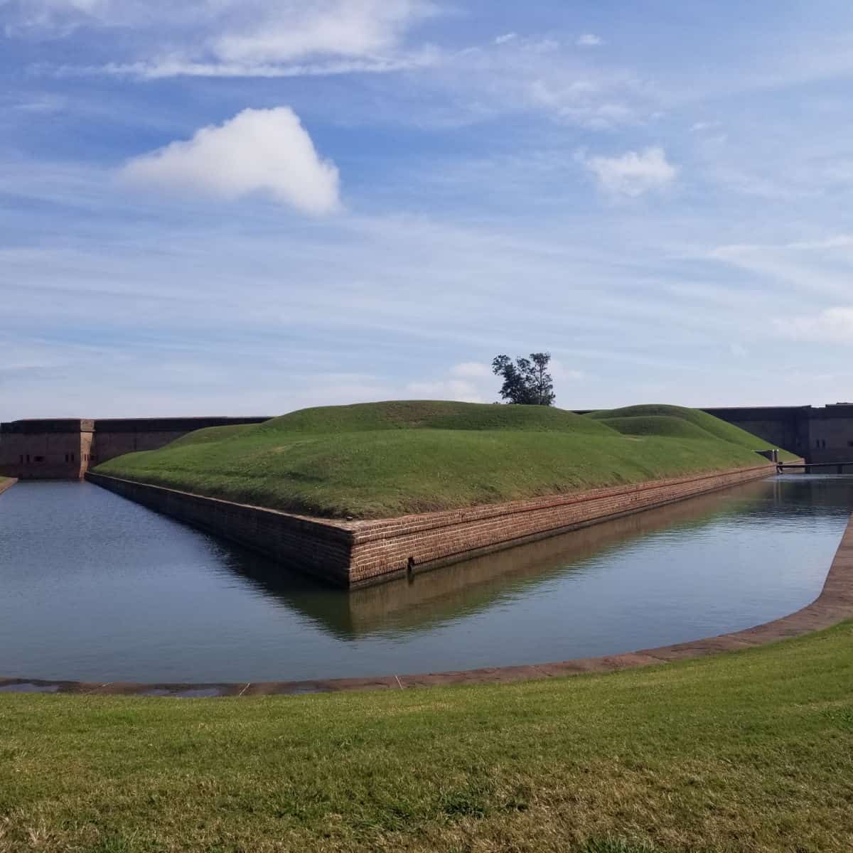 Water in the moat surrounding Fort Pulaski on a sunny day
