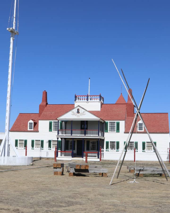 Fort Union Trading Post building with white paint and a red roof