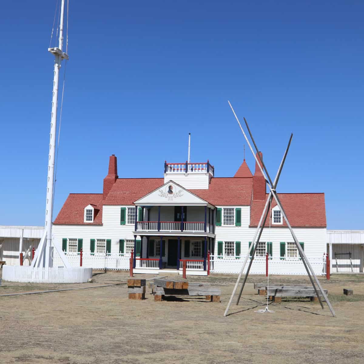 Fort Union Trading Post building with white paint and a red roof