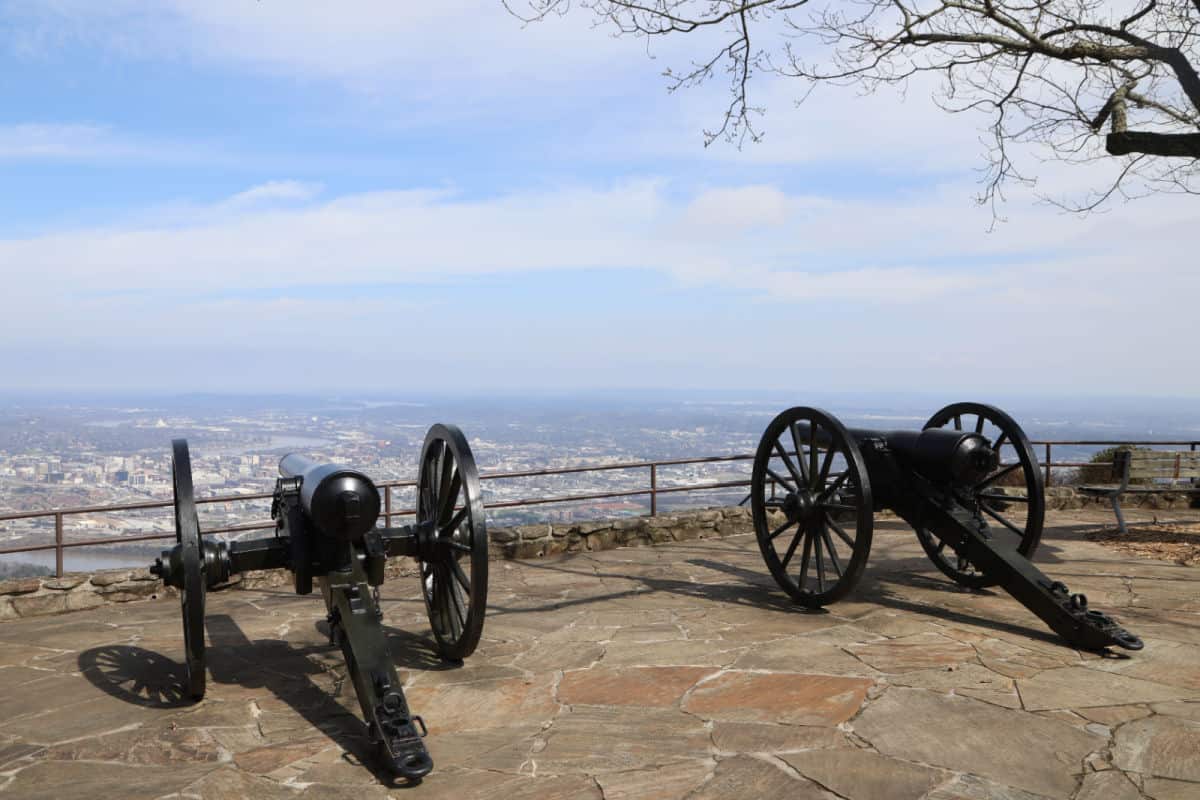 Two historic cannons with views of Chattanooga in the background