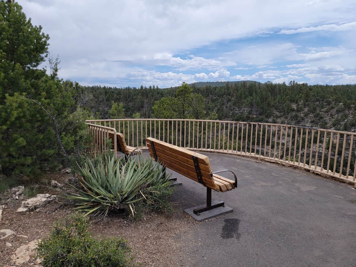 Scenic overlook with park benches looking out at Walnut Canyon NM