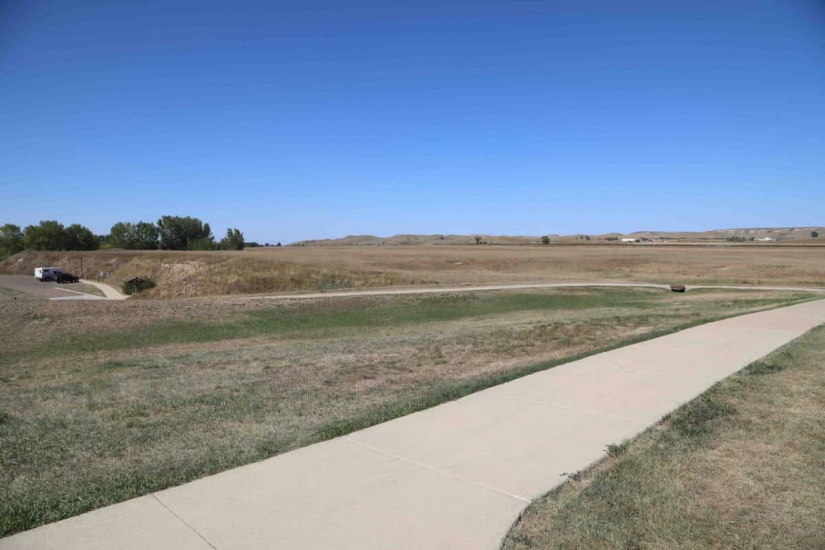 paved path leading up from the parking area to Fort Union Trading Post