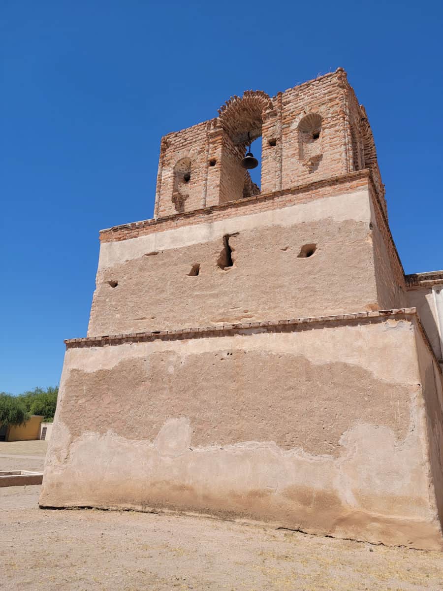 bell tower at the top of two story mission