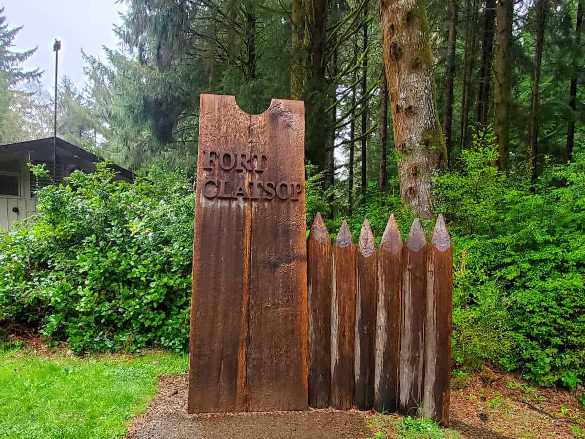 Fort Clatsop with sign in the background