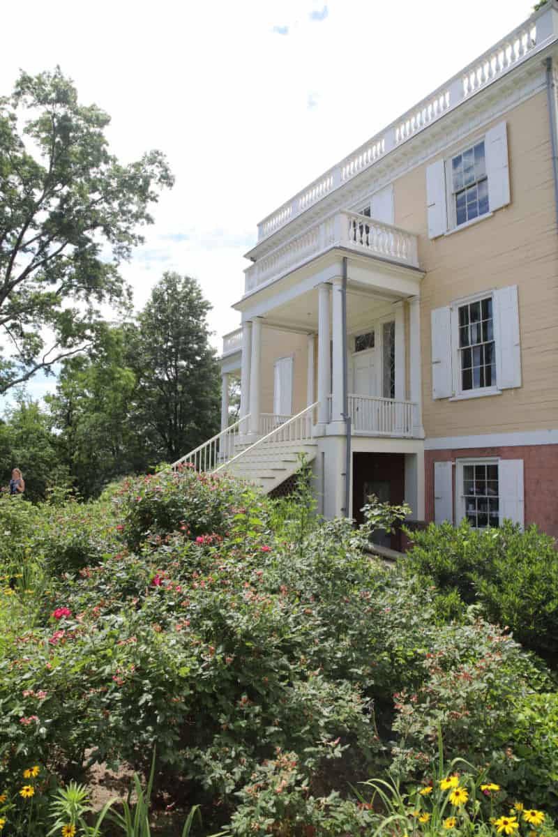 Flowering bushes in front of Hamilton Grange