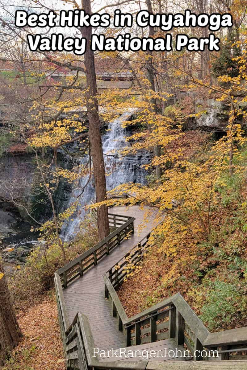 Text reading "Best Hikes in Cuyahoga Valley National Park" with photo of trail leading down to Brandywine Falls