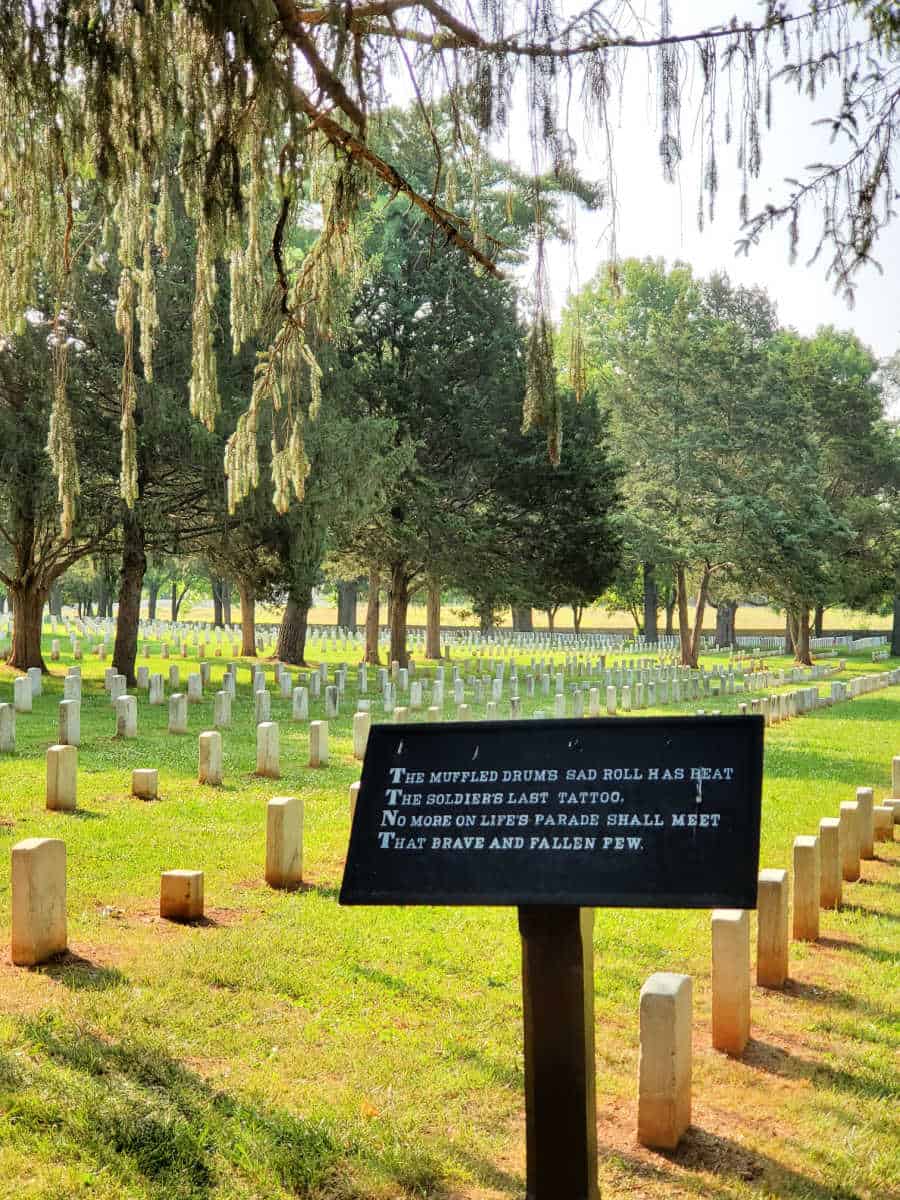 Historic cemetery with trees and moss