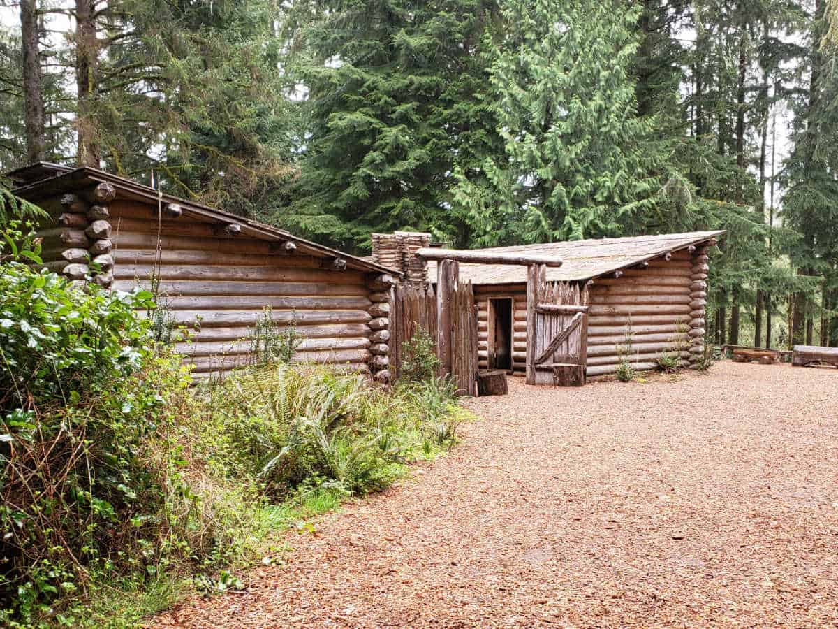 Historic wooden fort surrounded by trees