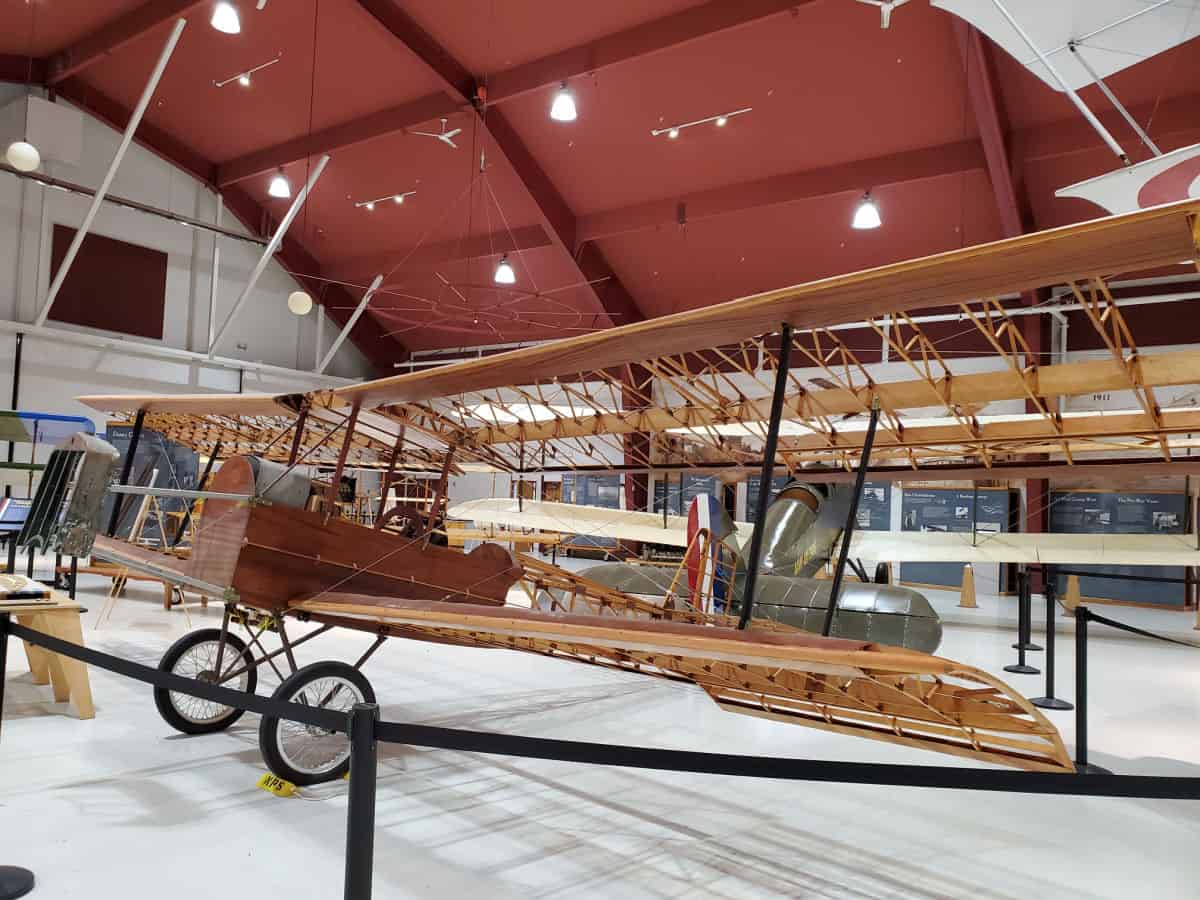 historic wooden plane in hanger