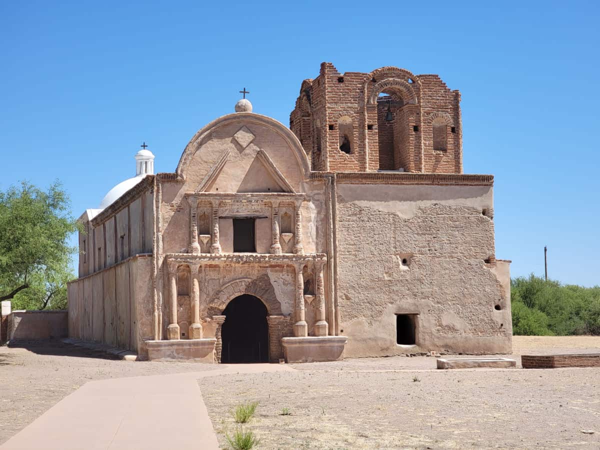 paved path leading to historic mission