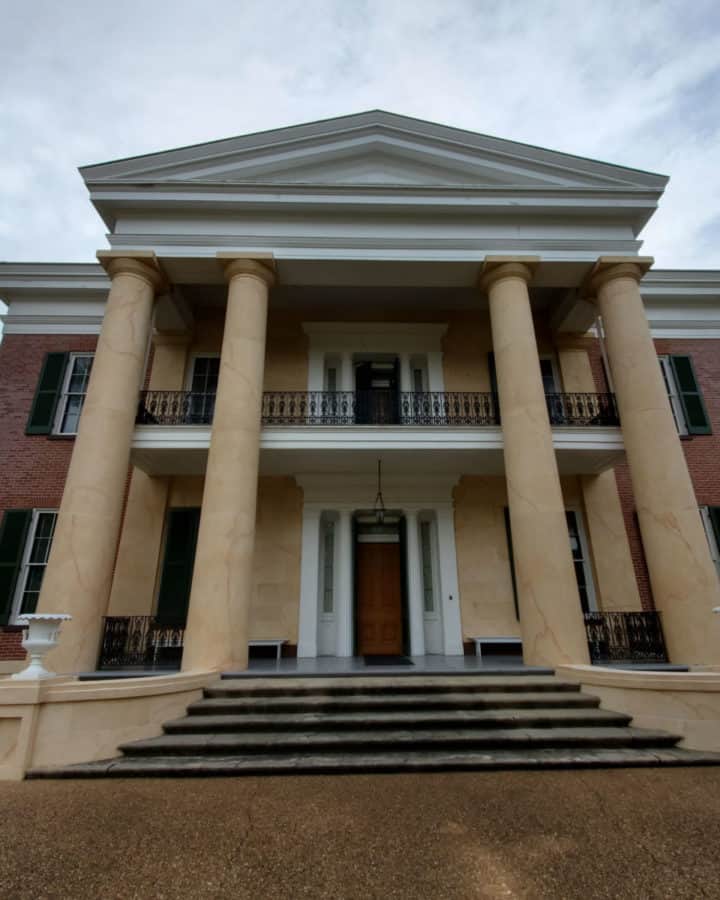 Front entrance to two story antebellum home with columns