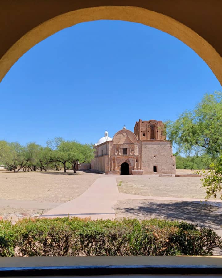 Tumacacori Mission through an arched window