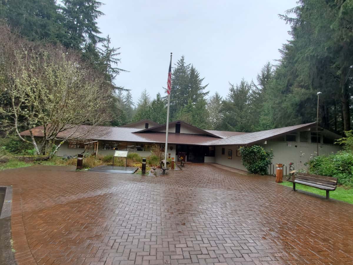 brick walkway leading up to the Lewis and Clark NHP visitor center with American Flag