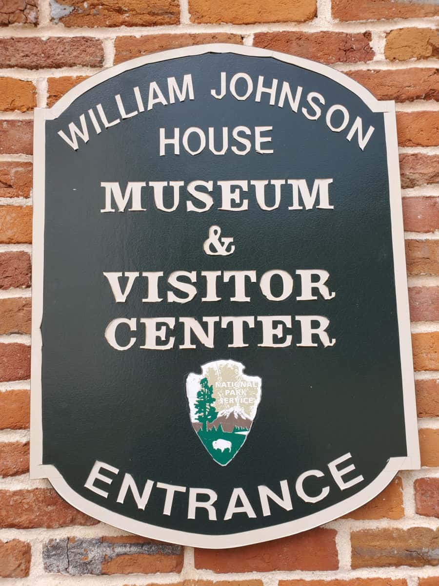 William Johnson House museum and visitor center entrance sign
