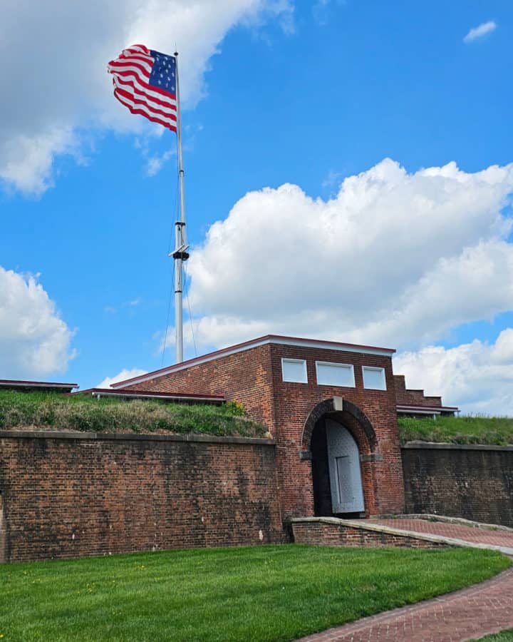 Fort McHenry with historic flag blowing in the wind