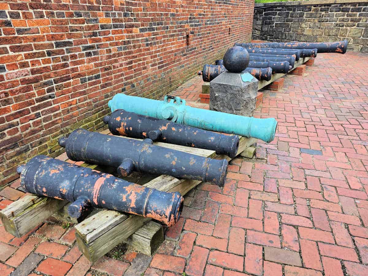 Historic cannons lined up inside of Fort McHenry National Monument