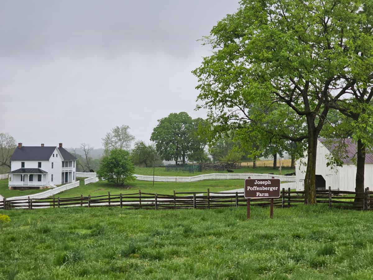 Joseph Poffenberger Farm with farmhouse and wooded fence in Antietam National Battlefield