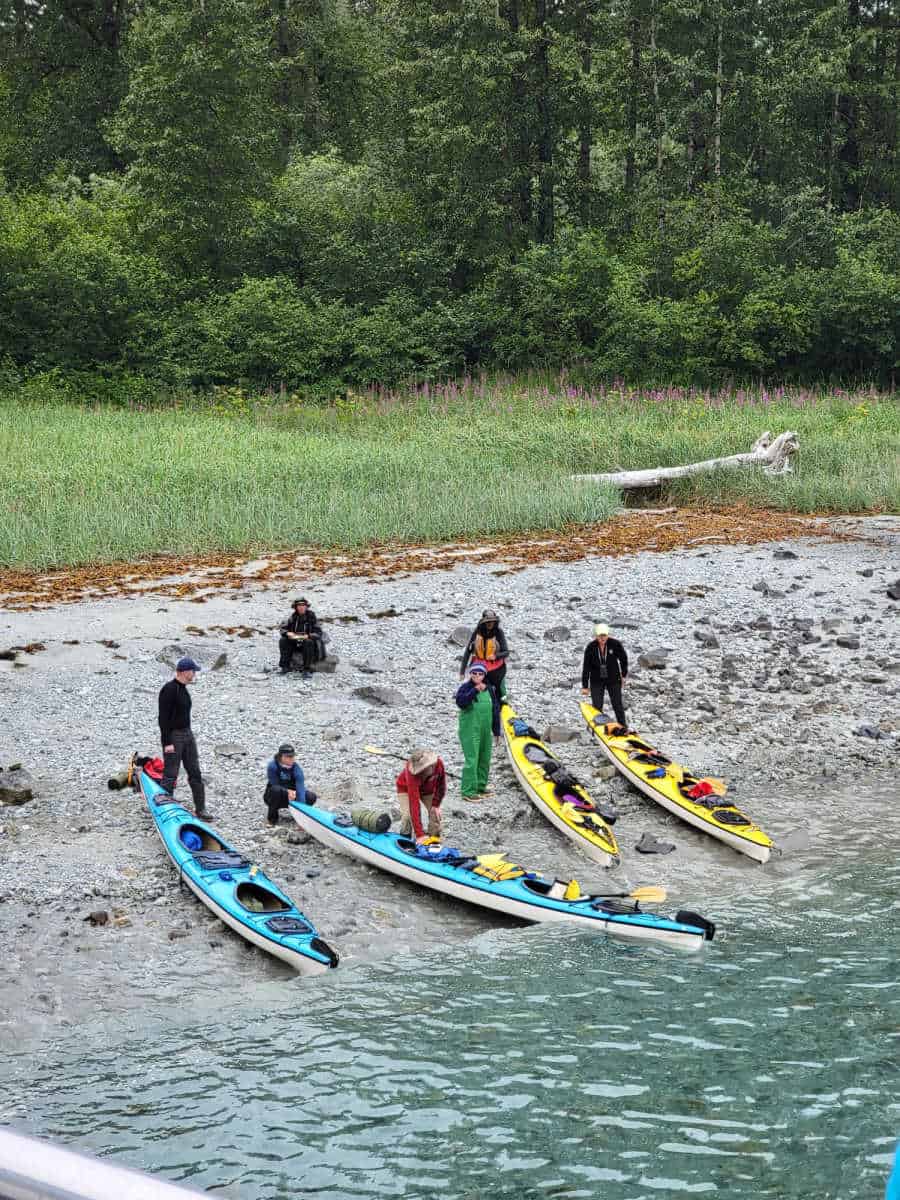 Kayakesrs being dropped off in the Inside Passage of Glacier Bay National Park