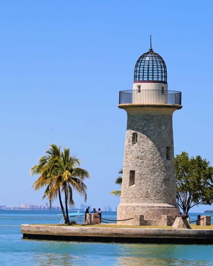Boca Chita Key Lighthouse with Miami Cityline in background at Biscayne National Park