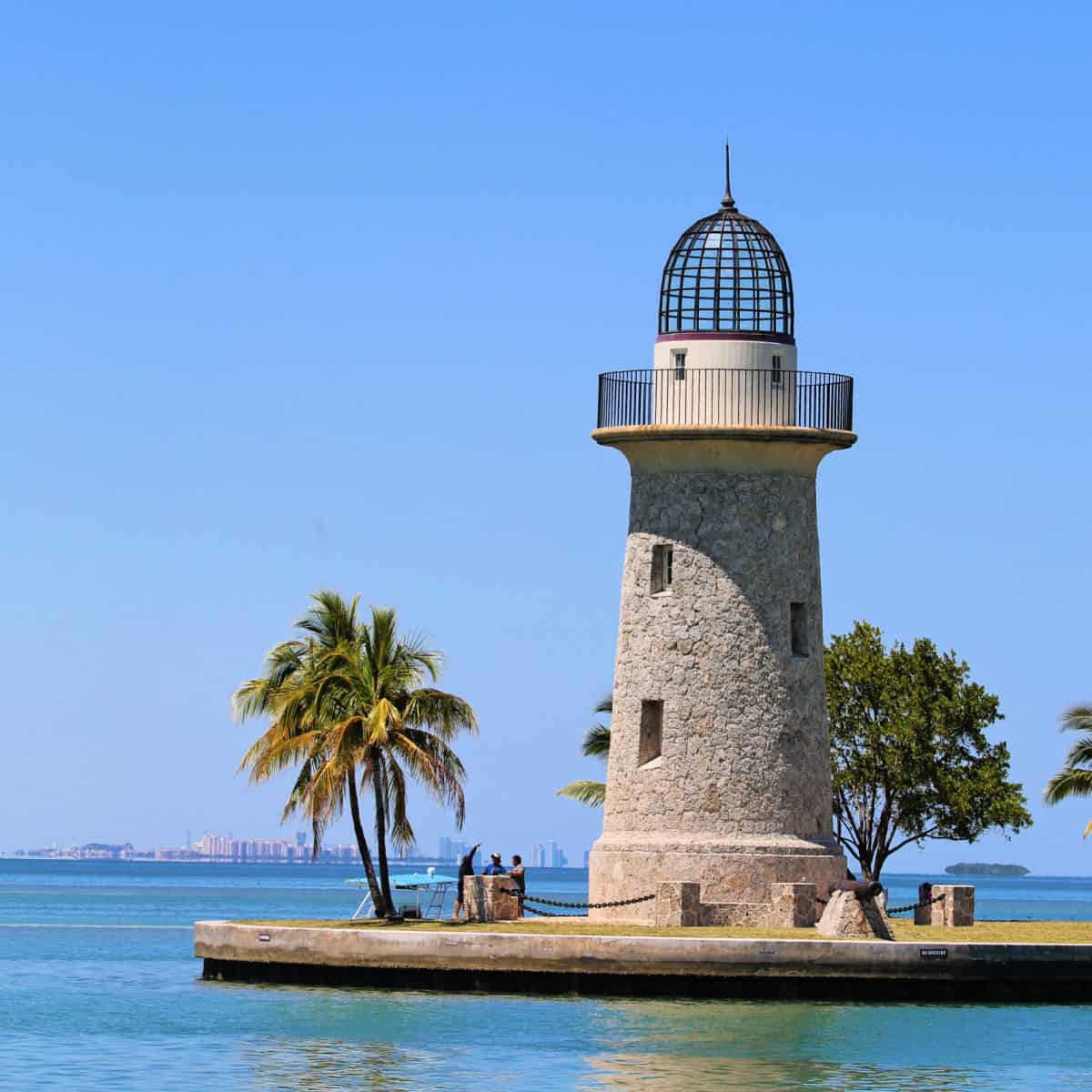 Boca Chita Key Lighthouse with Miami Cityline in background at Biscayne National Park