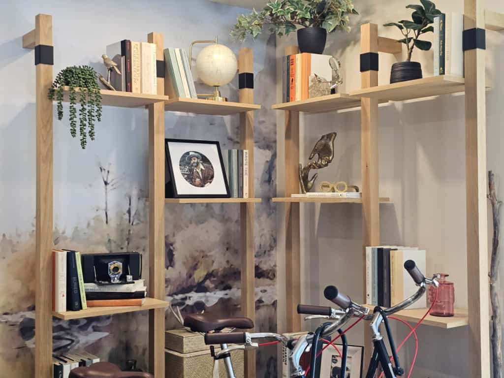 shelves with books, john muir and ansel adams photos