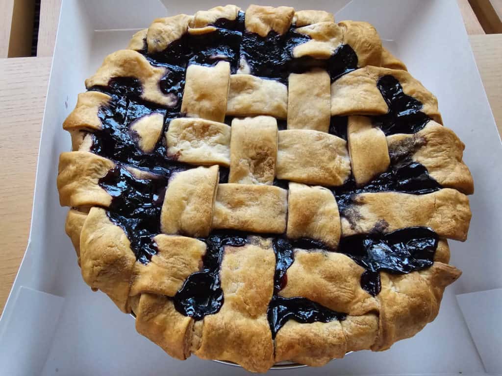 blueberry pie in a white box