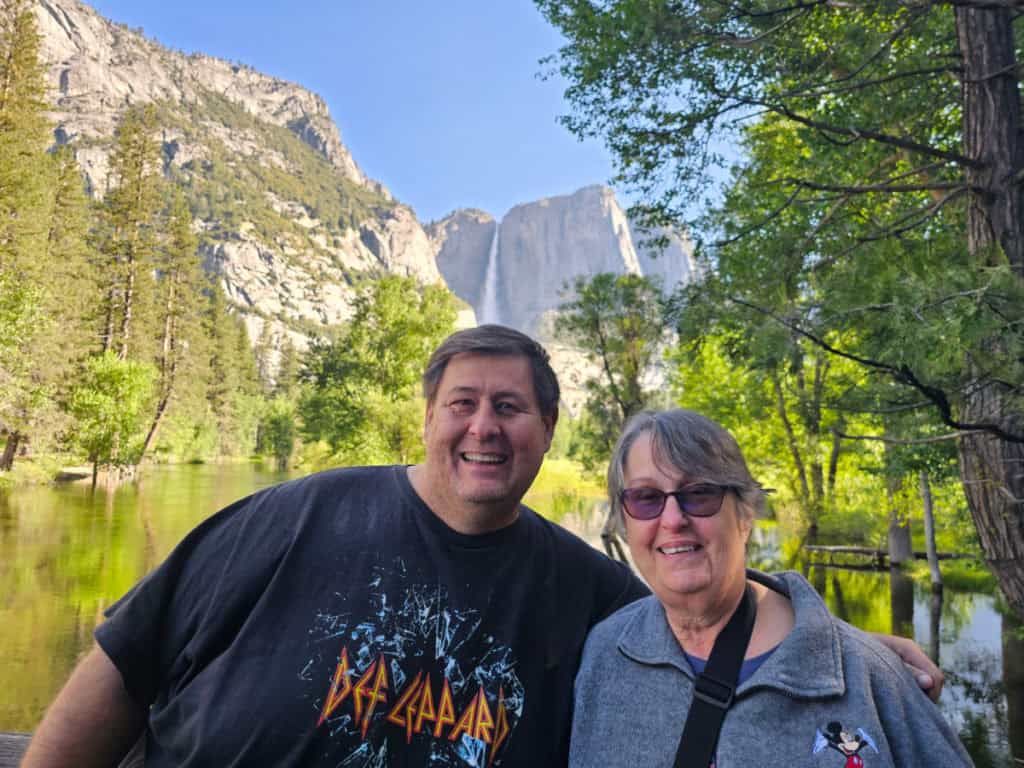 john and his mom with yosemite falls in the background