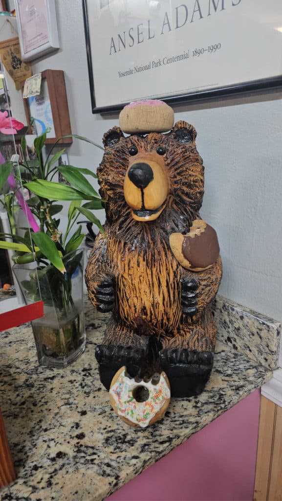carved bear with donuts