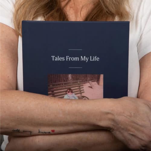 Holding a remento book with info