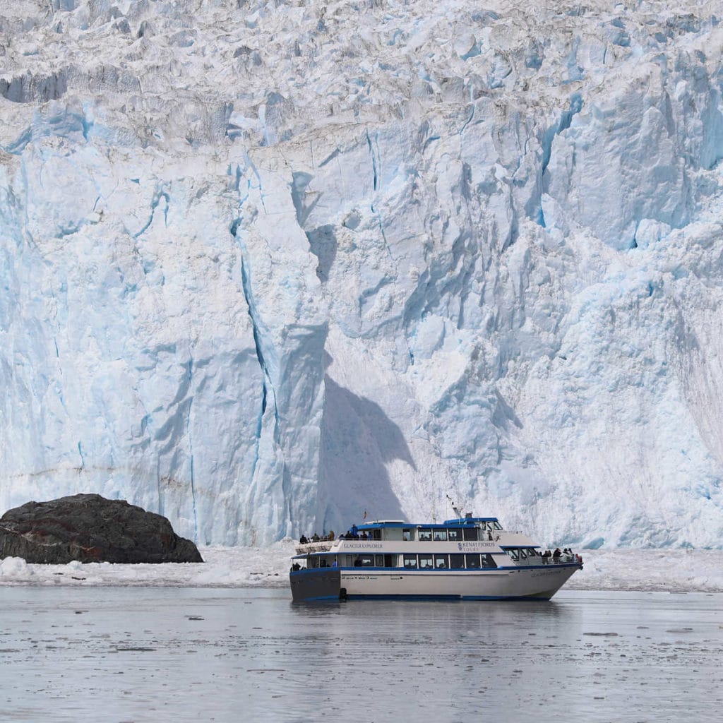Kenai Fjords Tour Boat in front of Glacier in Kenai Fjorda National Park