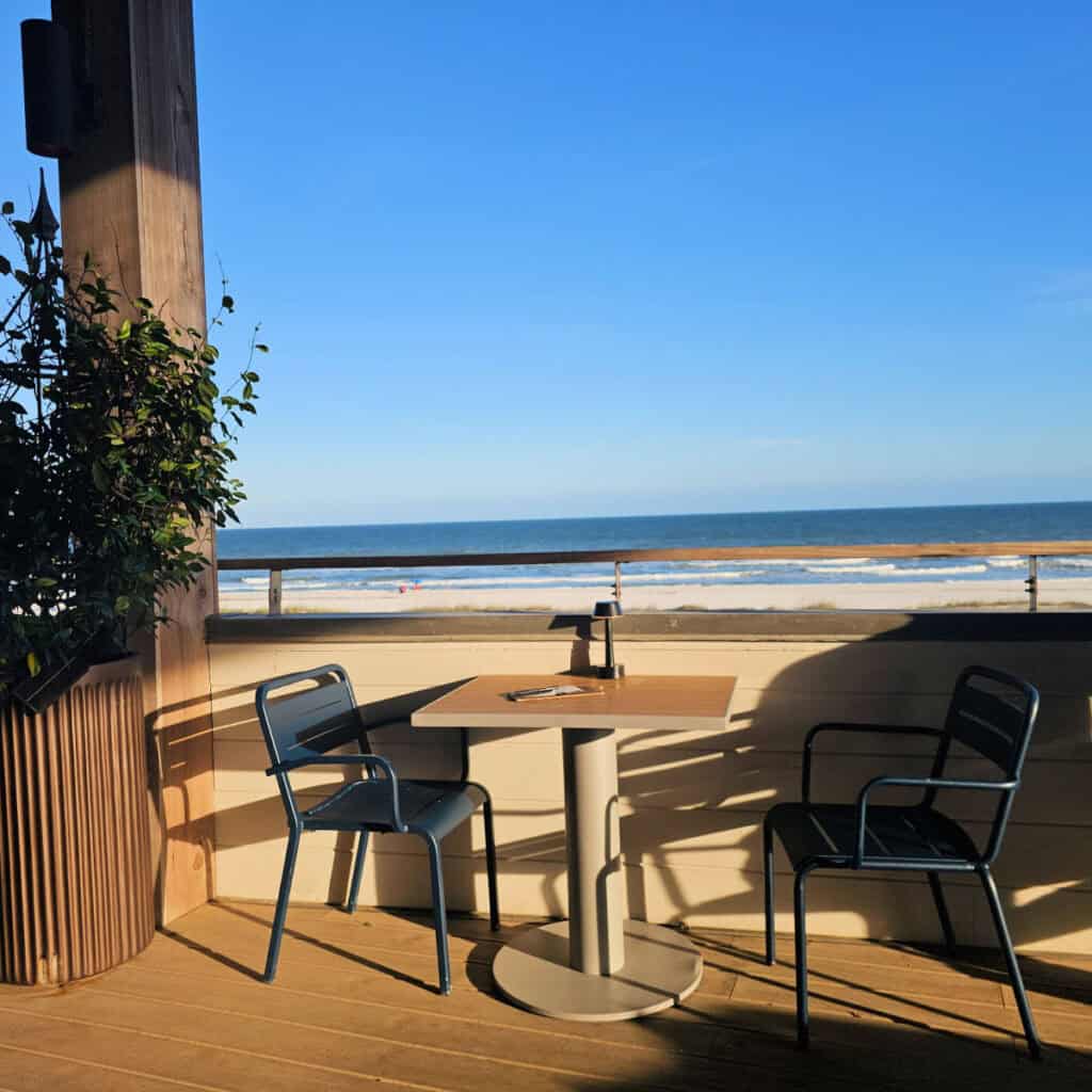 Outside seating at Perch with view of the Gulf of Mexico